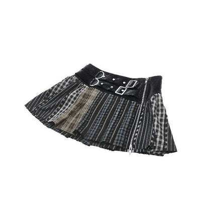 Full-length display of the Dark In Love Sage Patchwork Mini Skirt, capturing its exquisite pleated design and vibrant plaid patterns, perfect for a luxurious alternative fashion statement.
