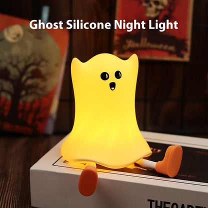 Charming Halloween Silicone Ghost Shaped Bedside Lamp illuminating a stylish setting, demonstrating its role as a whimsical yet luxurious decorative piece.