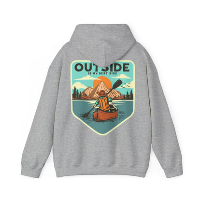 Elevate your style with the grey retro back print hoodie featuring a captivating design of a kayaker, mountains, and sunrise, showcasing the phrase 'OUTSIDE IS MY BEST SIDE'.