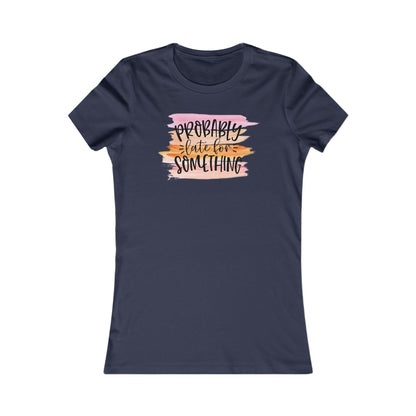 Navy women's t-shirt adorned with the intriguing phrase 'Probably Late for Something', beautifully presented in a handwritten style with a soft watercolor effect.
