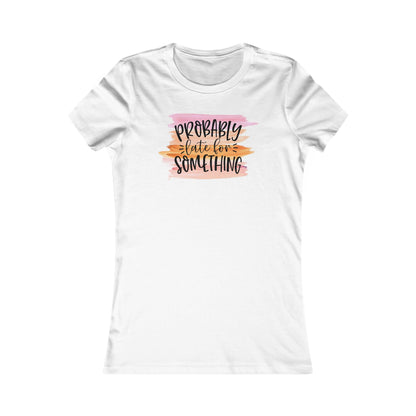 White women's t-shirt featuring a bold graphic design with the phrase 'Probably Late for Something' in stylish handwritten lettering against a pastel watercolor background.