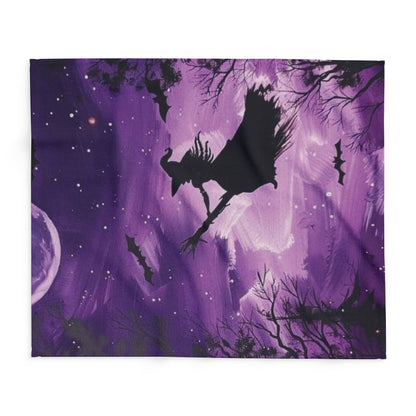 Artistic view of the Decorative and Warm Halloween Spooky Arctic fleece blanket, featuring a striking design of a witch against a moonlit purple sky.