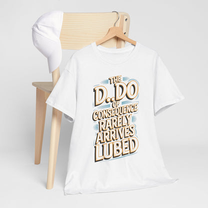 Karma Funny Gift Graphic T-Shirt on a hanger alongside a stylish white cap, featuring the witty phrase 'The D.O. of Consequence Rarely Arrives Lubed' for a unique fashion statement.