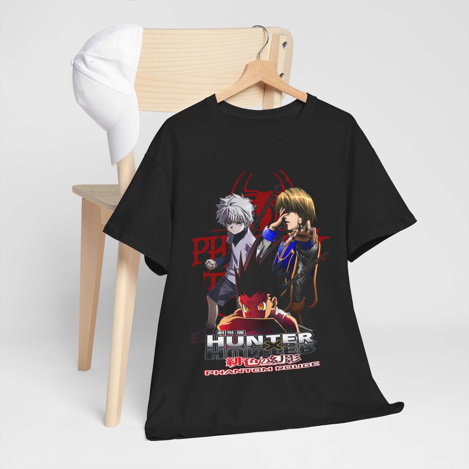 Stylish display of Hunter x Hunter T-shirt on a chair, showcasing vivid graphics of Gon, Killua, and Hisoka, perfect for anime enthusiasts and collectors.