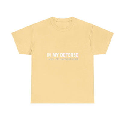 Chic Yellow Urban Graphic T-Shirt displaying 'In My Defence I Was Left Unsupervised,' blending luxury and comfort effortlessly.