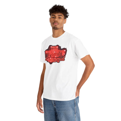 Sophisticated portrait of a model wearing a white T-shirt featuring 'THE UPSIDE DOWN' neon-red design, blending modern and nostalgic elements.