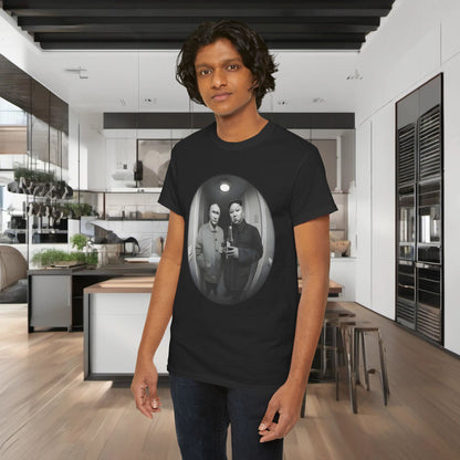 Fashionable scene featuring a man in a Meet The Neighbours Funny Gift Graphic T-Shirt, embodying modern style and wit.