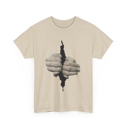 Let Me Out Funny Graphic Unisex T Shirt showcasing a striking graphic of clasped hands emerging from a tear, a blend of artistry and humour for distinctive wear.