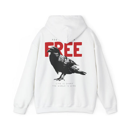 Elegantly designed white hoodie featuring a striking raven graphic and bold red text that reads 'YOU WERE BORN FREE'. Inspirational quote 'LIFE IS SHORT THE WORLD IS WIDE' embellishes the piece, making it a unique addition to any luxury wardrobe.