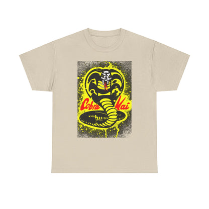 Elegant unisex Cobra Kai T-shirt featuring the iconic Cobra emblem in bold colours on a soft beige fabric, perfect for martial arts enthusiasts.