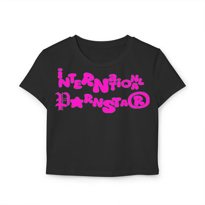 Elegant international star graphic women's crop t-shirt in black with eye-catching pink lettering, a bold piece for fashion-forward women.