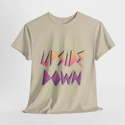 Luxurious beige t-shirt featuring a bold 'UPSIDE DOWN' graphic design in vibrant pastel shades, perfect for fashion-forward individuals.