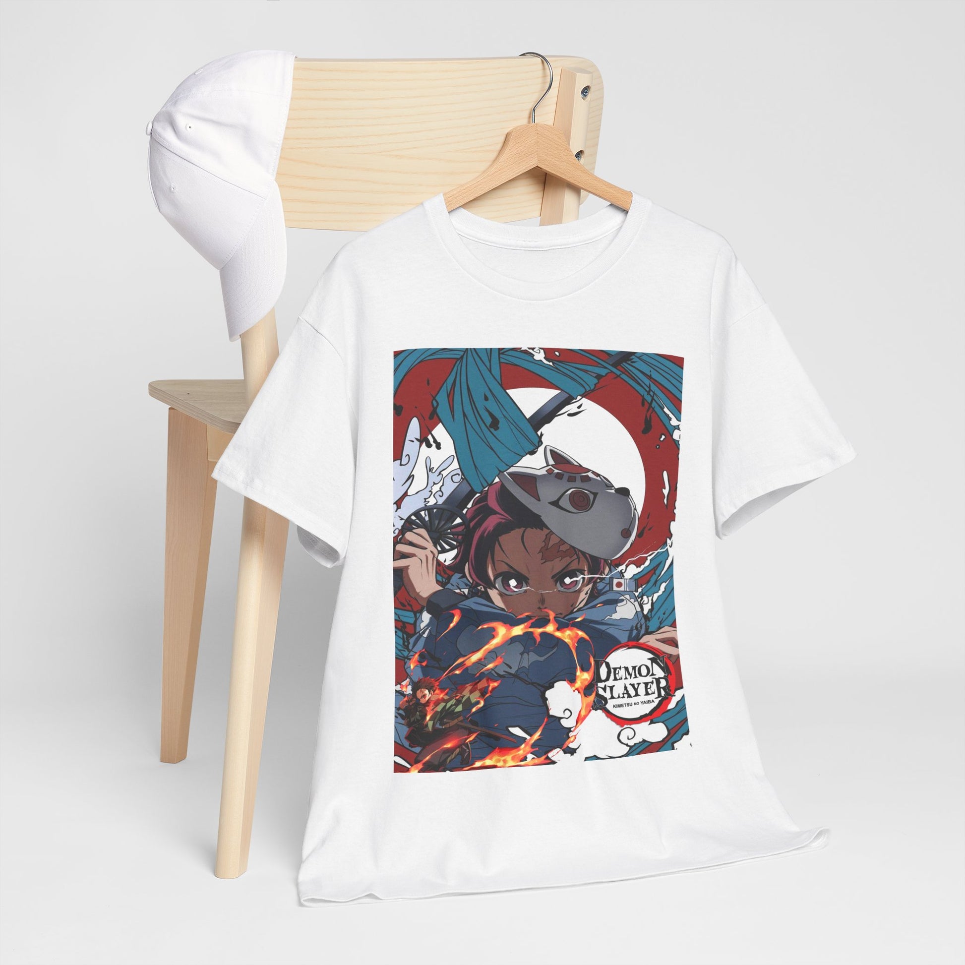 Sophisticated presentation of a white t-shirt with eye-catching demon slayer artwork, paired with a chic cap, embodying modern anime fashion.