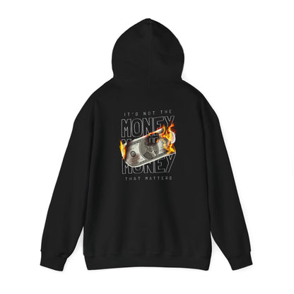 Stylish black hoodie displaying a powerful graphic design featuring a flaming dollar bill, embodying the message 'IT'S NOT THE MONEY THAT MATTERS' for a trendy look.