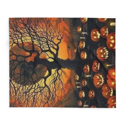 Artful display of the Decorative and Warm Halloween Spooky Arctic Fleece Blanket, highlighting a striking image of pumpkins and a twisted tree, adding an enchanting touch to any room.