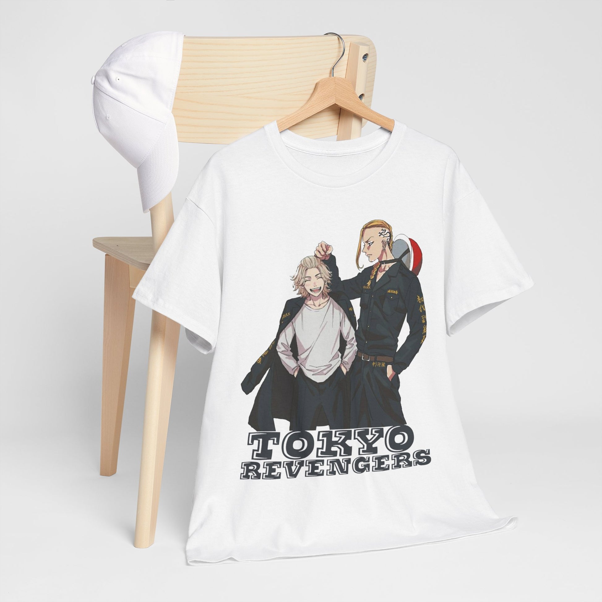 Stylish Tokyo Revengers tee displayed on a wooden chair, combined with a cap, offering a chic anime-inspired fashion statement.