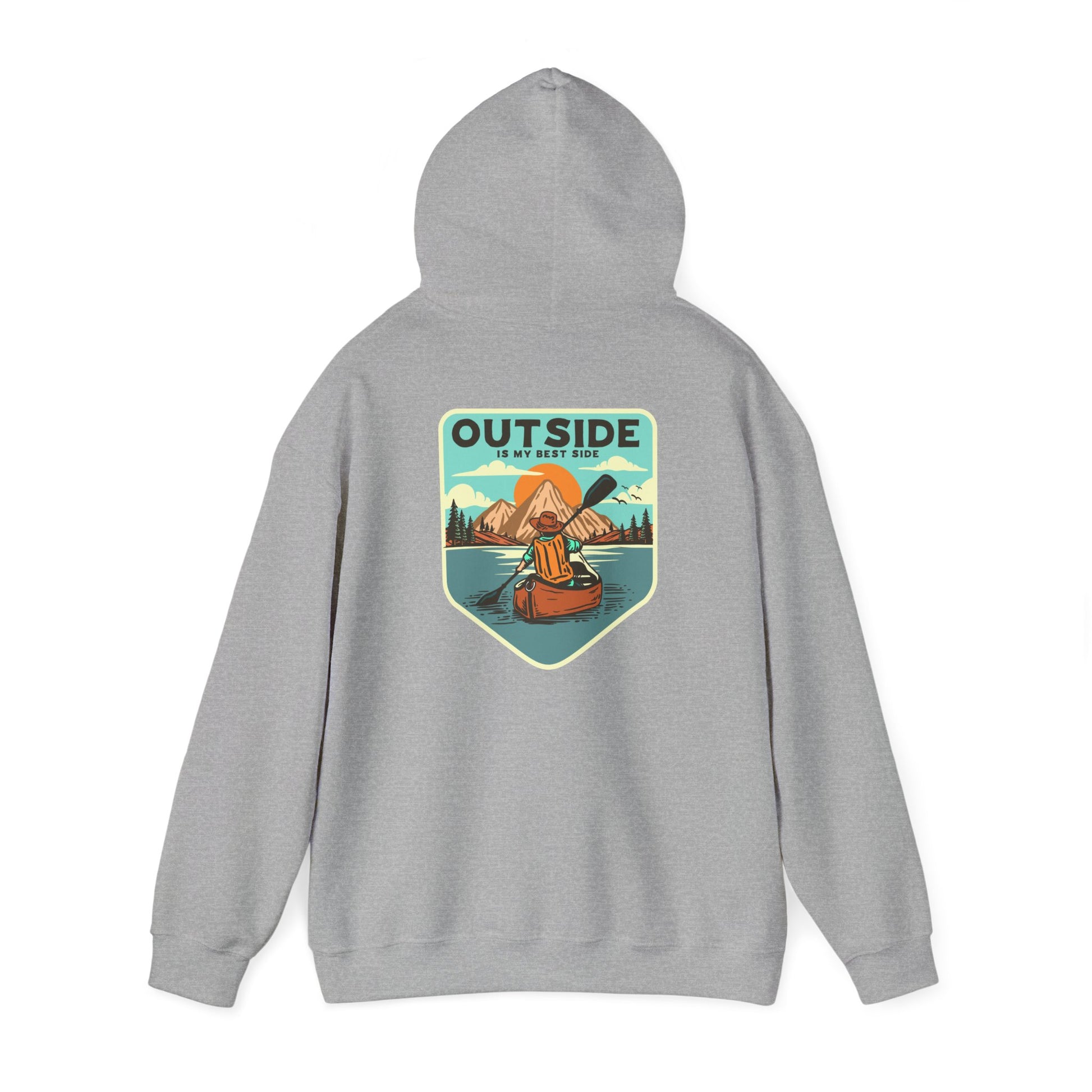 Chic grey hoodie with a striking back design showcasing a kayaker on a tranquil lake, surrounded by mountains and trees, embellished with the statement 'OUTSIDE IS MY BEST SIDE'.