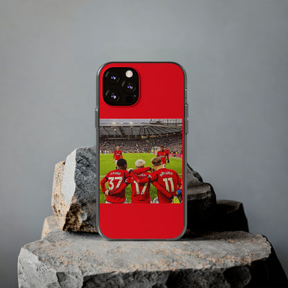 Stylish Manchester United Mainoo Garnach Hojlund Soft Phone Case displayed on a rugged stone background, highlighting its exquisite design for soccer fans.
