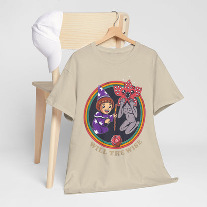 Elegant unisex graphic tee featuring a whimsical wizard girl and a friendly monster, boasting the phrase 'WILL THE WISE' on a beige background, perfect for fans of fantasy and adventure.
