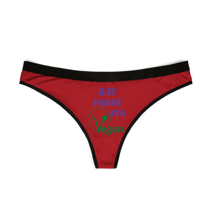 Luxurious women's thong panties in vibrant red, featuring playful text 'Eat Pussy It's Vegan' in bold, colourful lettering, designed for a cheeky yet stylish appeal.