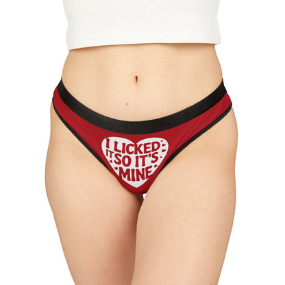 A model showcasing the Valentines Naughty Gift Cheeky Womens Thong with the fun message 'I Licked It So It's Mine', designed to add a cheeky twist to Valentine's Day celebrations.