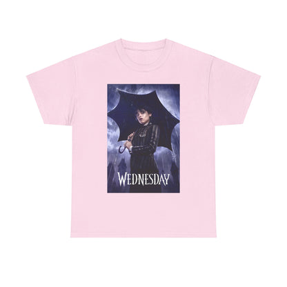 Chic pink unisex graphic tee displaying the 'Wednesday' Embrace the Dark Elegance design, illustrating a character with an umbrella amidst a mysterious atmosphere.
