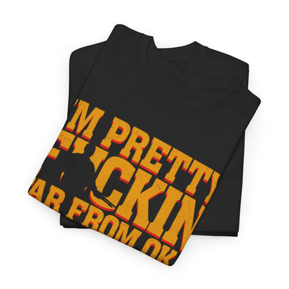 Elegant stacked view of two black graphic t-shirts displaying the bold message 'I'M PRETTY FICKIN FAR FROM OK.' in eye-catching colours, ideal for those who appreciate unique, stylish clothing.