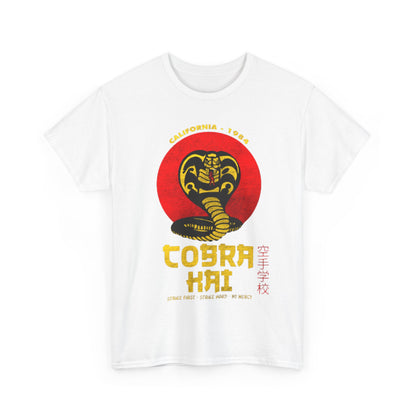 Sophisticated white t-shirt showcase featuring the classic Cobra Kai logo and mantra. This designer tee serves as a stylish statement piece for martial arts enthusiasts, harmonizing comfort and aesthetics.