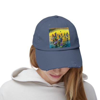 Front view of a stylish Unisex Distressed Paddleboarders Cap with a vibrant fantasy scene, ideal for outdoor beach and river escapades.