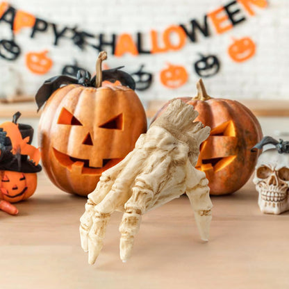 Halloween Electric Luminous Crawling Hand Animated Decoration displayed amongst carved pumpkins and festive decor, enhancing the Halloween spirit.