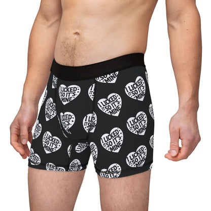 Luxury Valentine's Naughty Cheeky Men's Boxer Briefs showcased on a model, with bold heart graphics and the phrase 'I LICKED IT SO IT'S MINE', ideal for romantic gestures and special occasions.