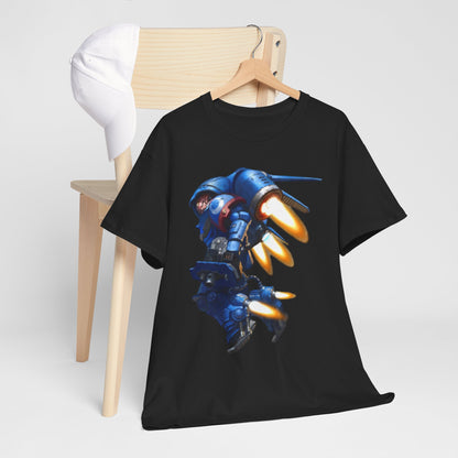 Stylish black graphic t-shirt featuring a vibrant blue mecha design with flames, elegantly displayed on a wooden hanger next to a white cap.