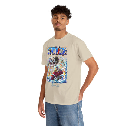 Fashionable young man posing in a beige t-shirt featuring Brook from One Piece, surrounded by a captivating design of water and flames, epitomizing contemporary anime style.