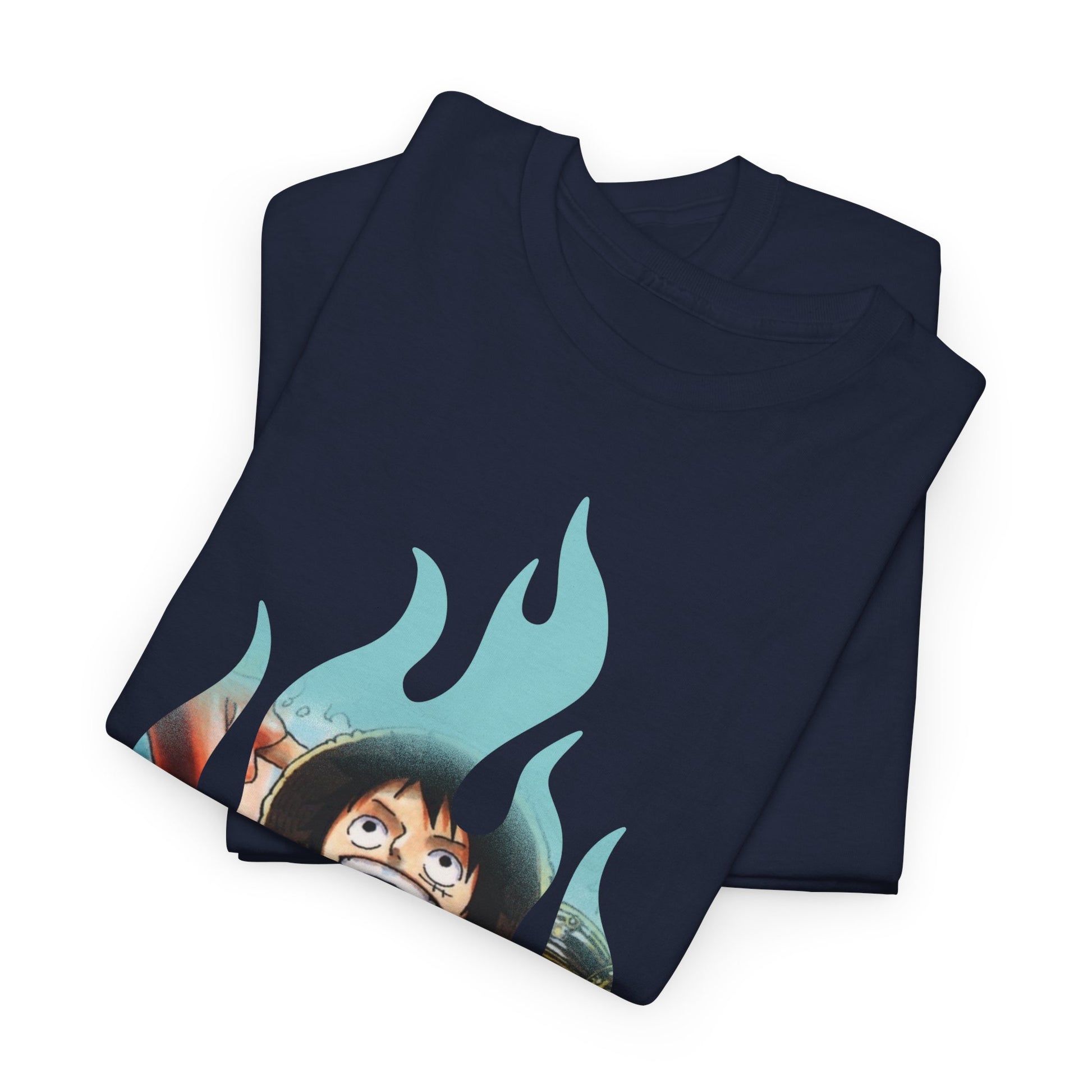 Close-up of folded navy blue t-shirts displaying stunning graphic art, presenting a playful character amidst vibrant flames.