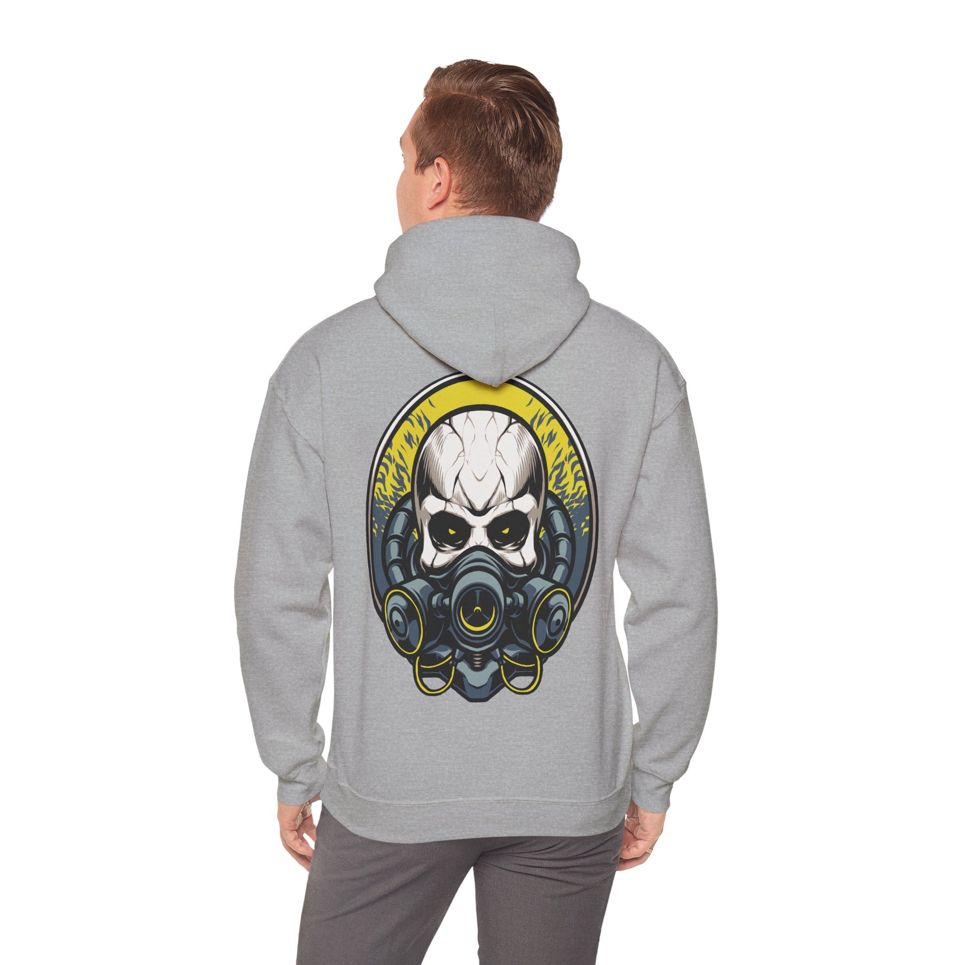 Stylish model wearing a luxurious grey hoodie adorned with a striking skull and gas mask graphic, exuding confidence and daring elegance.