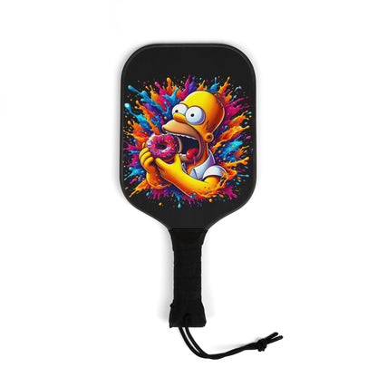 Urban Homer’s Hungry Delight Pickleball Kit featuring a vibrant 100% wood paddle design with a joyful character holding a donut, ideal for enhancing luxury gameplay.