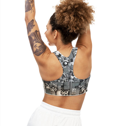 Chic Sports Bra from Valentina Belleveau featuring modern patterns, showcased on a model with curly hair and tattoos, raising her arms for an active pose. Perfect for ultimate comfort and support during any fitness routine.