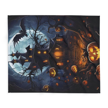 Decorative and Warm Halloween Spooky Arctic Fleece Blanket featuring a haunted house design with pumpkins and a moonlit sky, perfect for adding seasonal charm to your home.