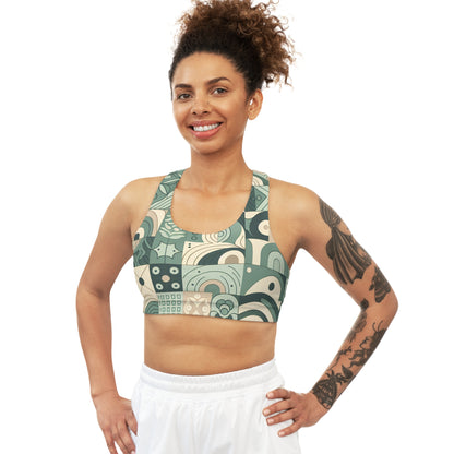 Model wearing the Aurelia Starling Sports Bra, displaying its contemporary block print design in soothing pastel green, perfect for workouts and leisure.