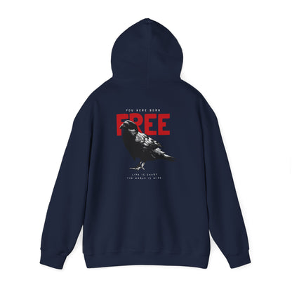 Luxurious navy hoodie featuring a striking black and white raven graphic, accompanied by bold red lettering stating 'YOU WERE BORN FREE', ideal for expressing individuality and style.