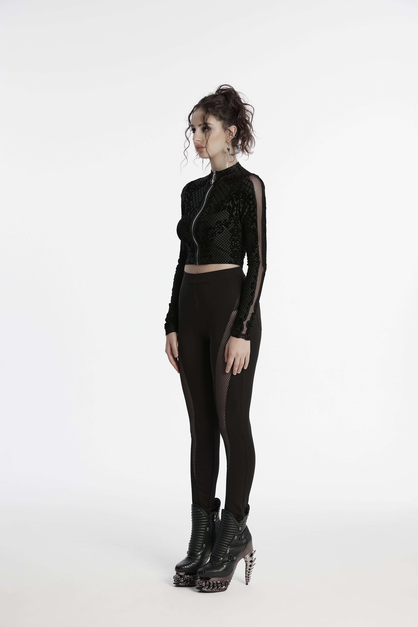 Punk Rave Ausha Leggings worn by model, highlighting their flattering fit and flexible fabric for a chic silhouette.