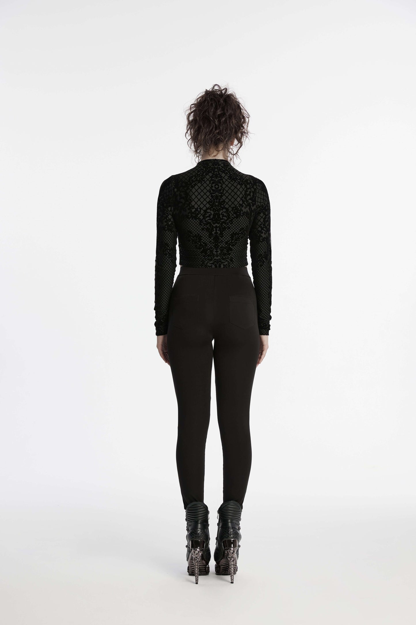 Detail shot of the honeycomb mesh on Punk Rave Ausha Leggings, demonstrating the intricate design and texture.