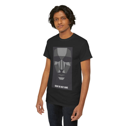 Model wearing a fashionable black tee with a striking geometric face graphic and 'BEGIN THE NEXT GAME' caption, embodying urban style.