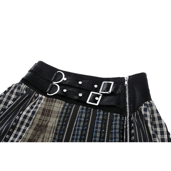 Detail image of the Dark In Love Skirt's intricate plaid patchwork, highlighting the blend of grunge and punk elements in this contemporary alternative fashion piece.