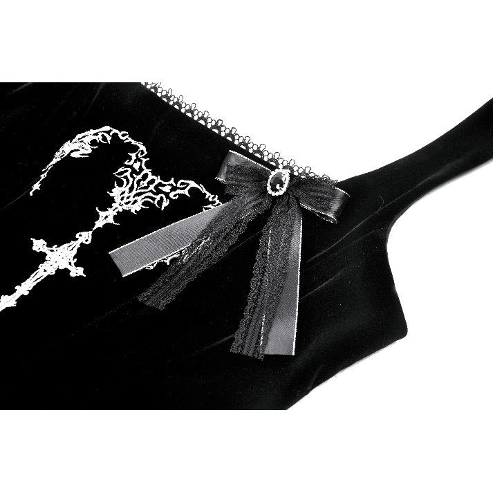 Close-up view of the luxurious black velvet fabric of the Dark In Love Maxi Dress, highlighting the exquisite horn embroidery detail.