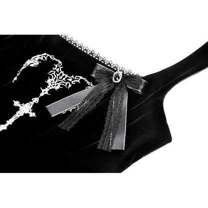 Close-up view of the luxurious black velvet fabric of the Dark In Love Maxi Dress, highlighting the exquisite horn embroidery detail.