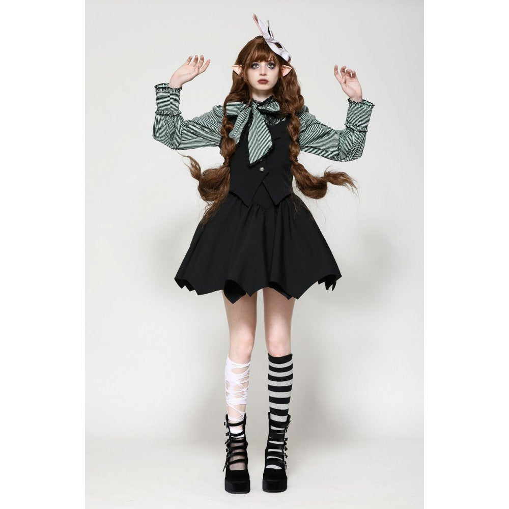 Close-up of the asymmetric button-up front of the Dark in Love Vespertilio Vest, illustrating the luxurious craftsmanship and unique design.