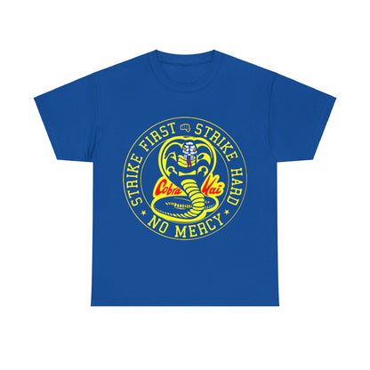 Cobra Kai Graffiti Graphic Unisex T-Shirt in royal blue adorned with a bold yellow and red cobra design and the powerful message 'Strike First, Strike Hard, No Mercy'. An elegant choice for Cobra Kai fans.