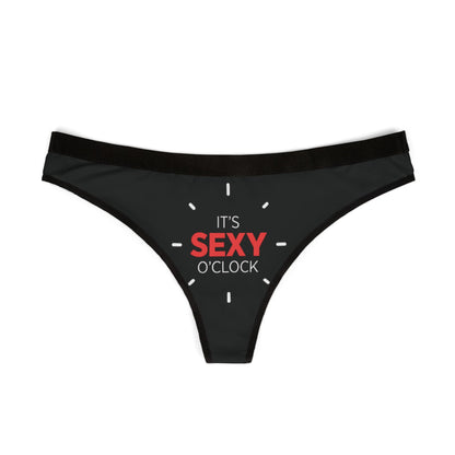 Luxurious women's thong featuring a bold print that reads 'IT'S SEXY O'CLOCK', designed for playful intimacy and romantic moments, ideal for Valentine's Day and special occasions.