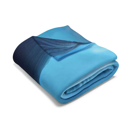 Sumptuously folded Arctic fleece blanket featuring a striking design, perfect for snuggling up and celebrating Halloween in style.